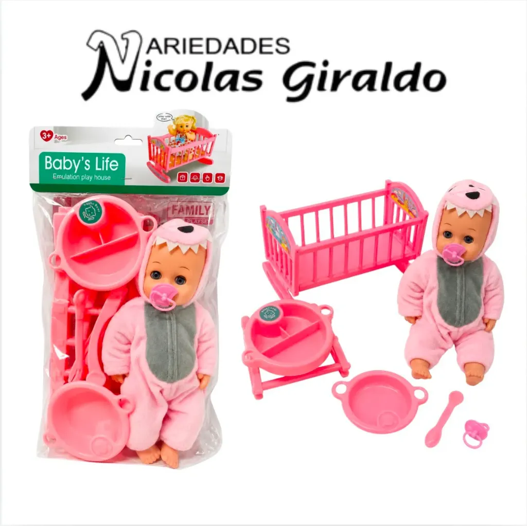 Bebe con cuna y accesorios